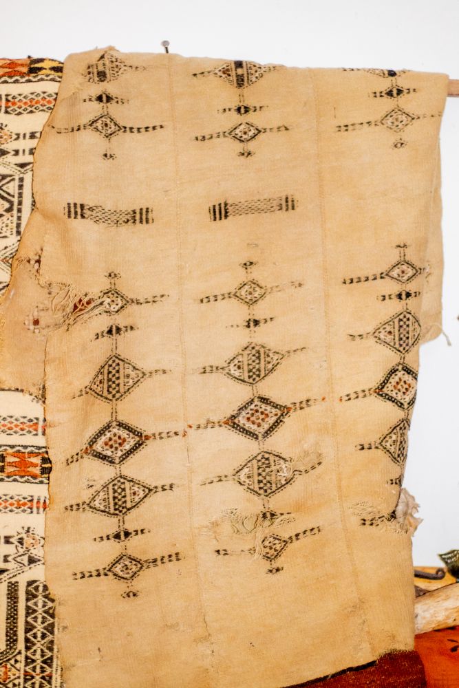 Cream hand-woven cloth with dark diamond motifs