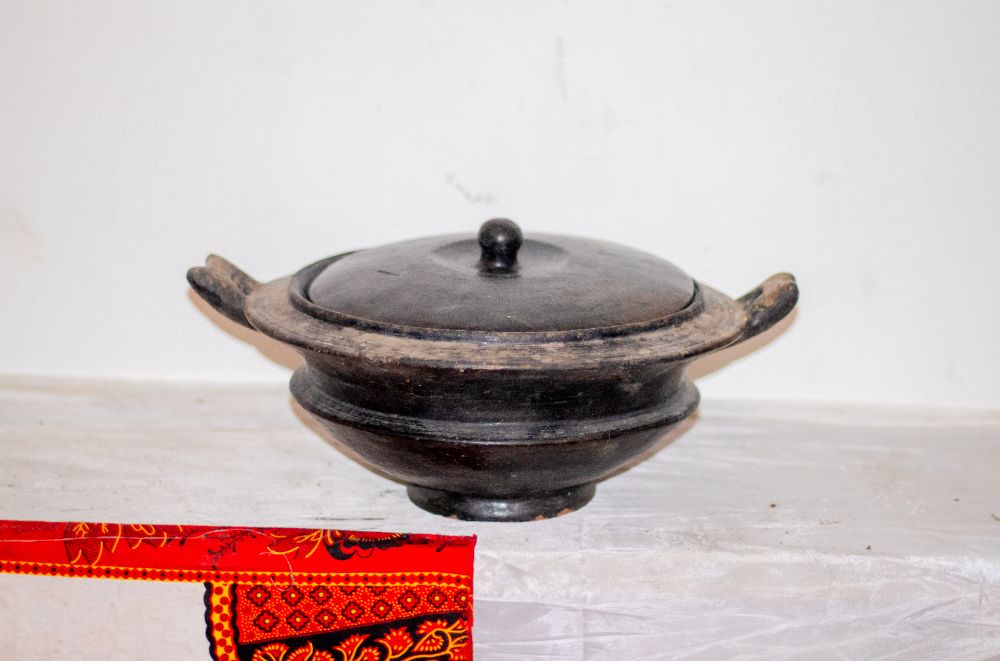 A black clay lidded tureen with two handles